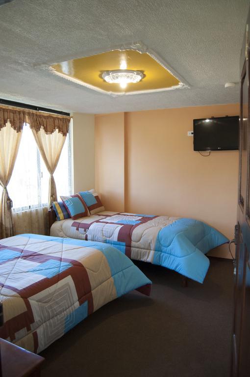 Hotel Residencial El Viajero Tababela Quarto foto